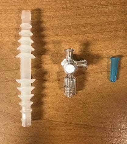 Figure 32b. Connectors can be used to connect IV tubing and nasal cannula tubing (left to right): tubing connector, stopcock connector, syringe tip cap (cut off top with scissors).